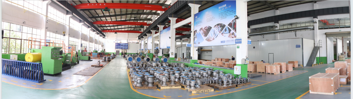 SMD Valves factory floor with machining equipment, valve assemblies and finished-product staging areas